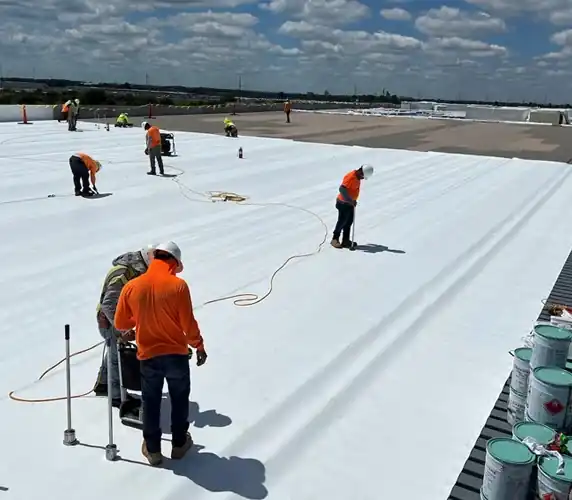 Commercial flat roof membrane installation crew South Florida