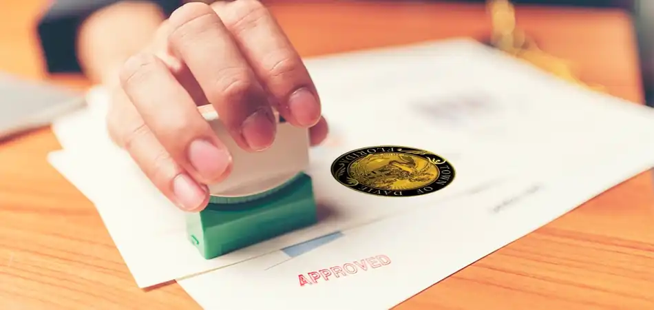 Approved permit stamp with Town of Davie Florida seal on document