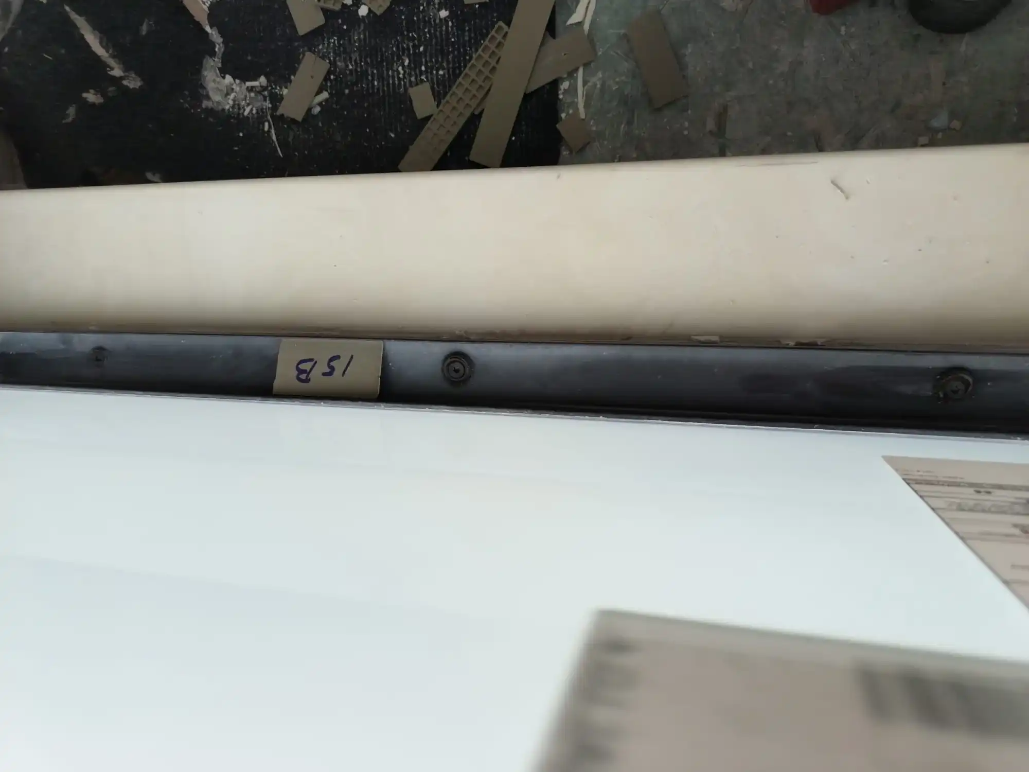 Impact window sill track component labeled during installation Weston Florida