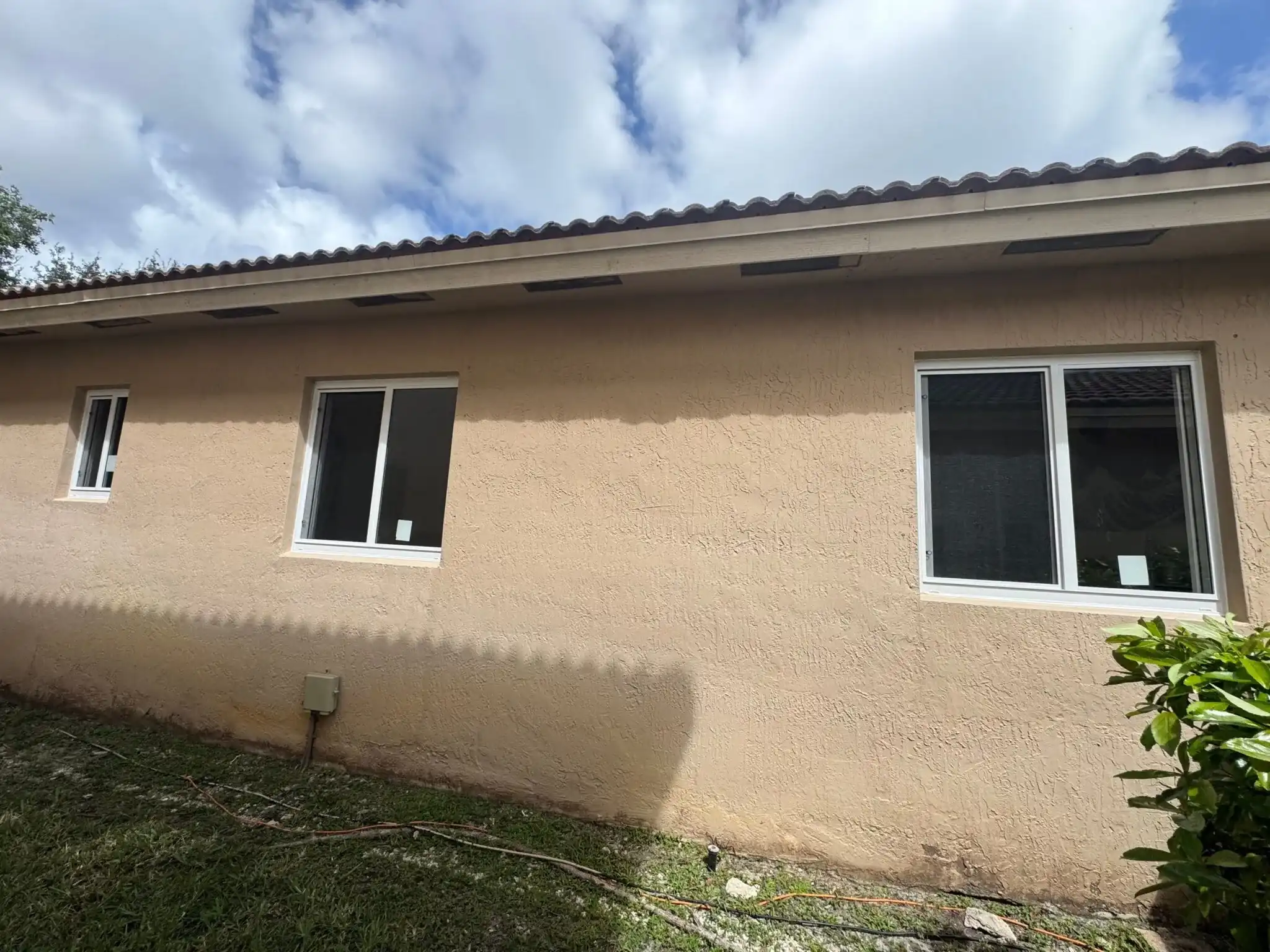 New impact windows installed on stucco home in Coconut Creek Florida
