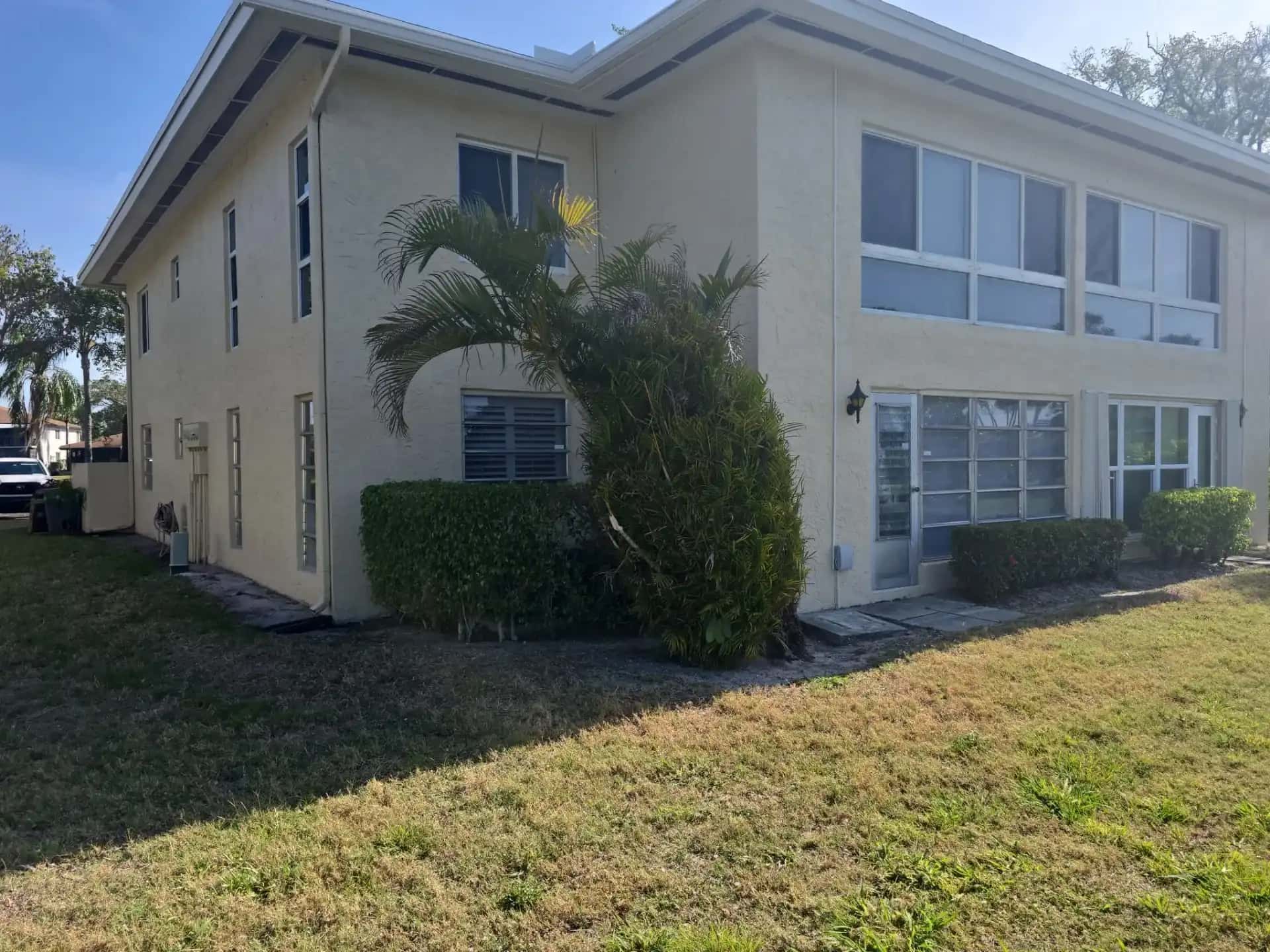 Two-story Delray Beach home with impact windows installed South Florida