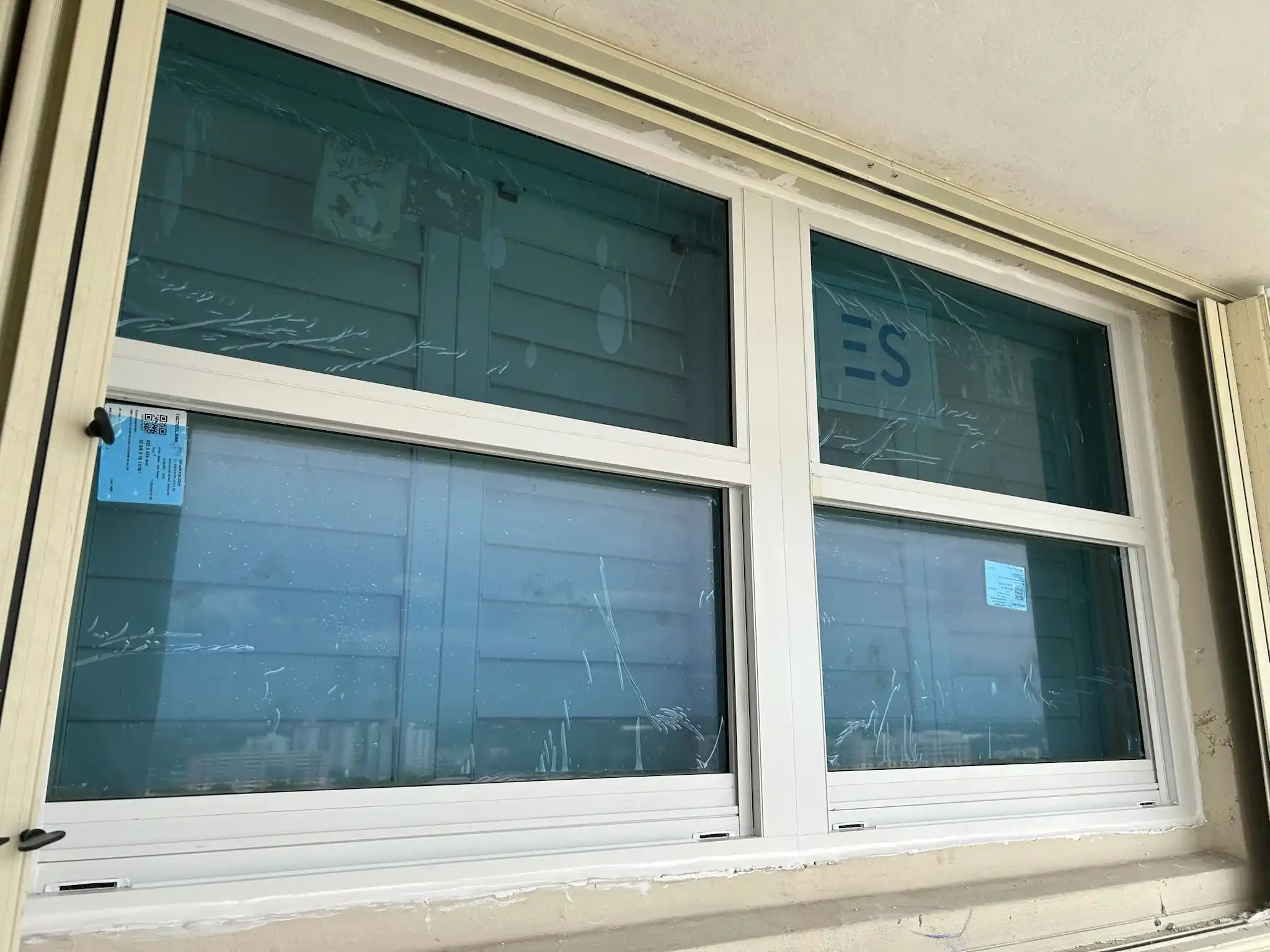 New impact windows with tinted glass installed at Pompano Beach condo