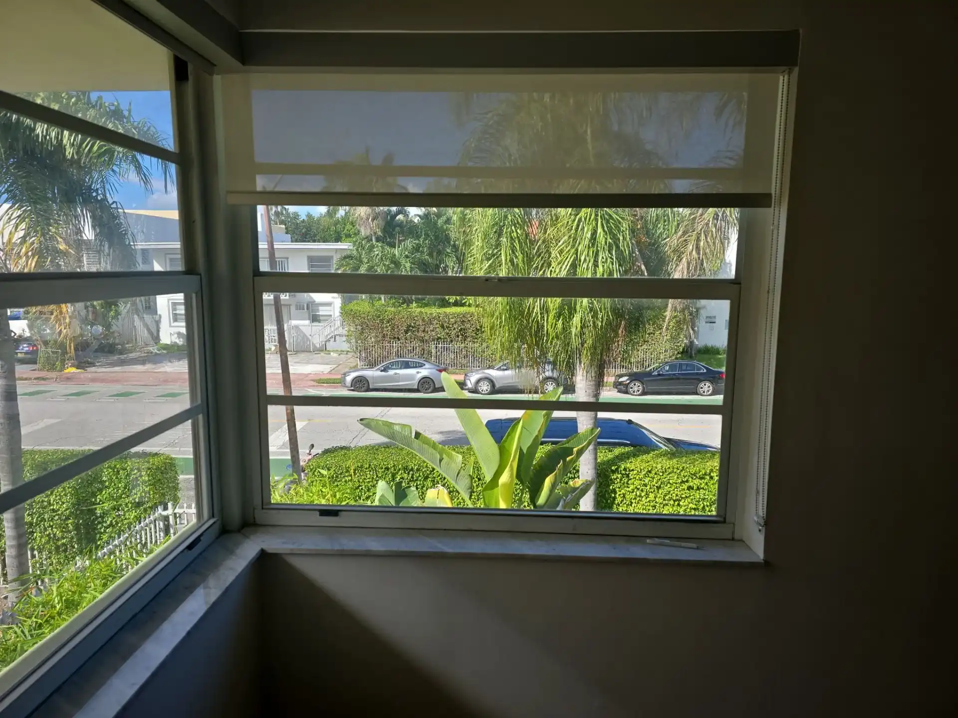 White-frame impact windows in a Miami Beach apartment unit